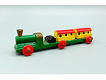 Tren de viajeros de arrastre (Goula, Barcelona, Espa�a, ca. 1940-1945). Medidas: 1,7 x 8 x 2 cm. Donaci�n: Familia Balbuena - Pieza IG: 08356