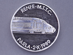 Medalla conmemorativa de la colocaci�n del primer tramo de v�a de ancho internacional para el tren de alta velocidad Madrid-Sevilla (1989) - Pieza IG: 06988